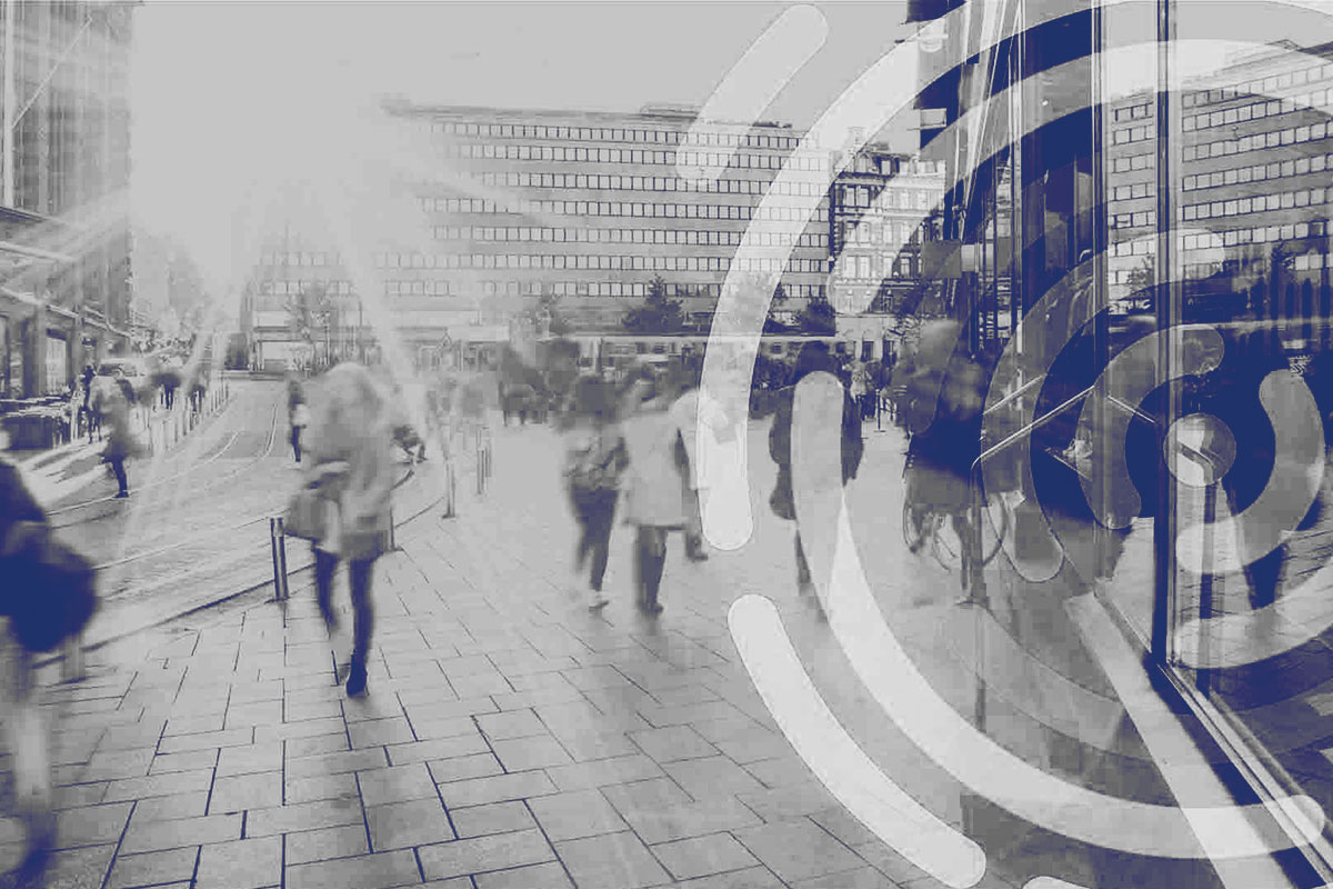 people walking on the streets of an urban area