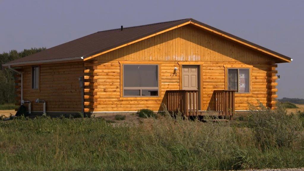 photo of a wooden log house