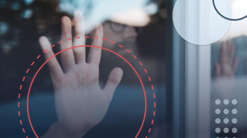 hand on a window