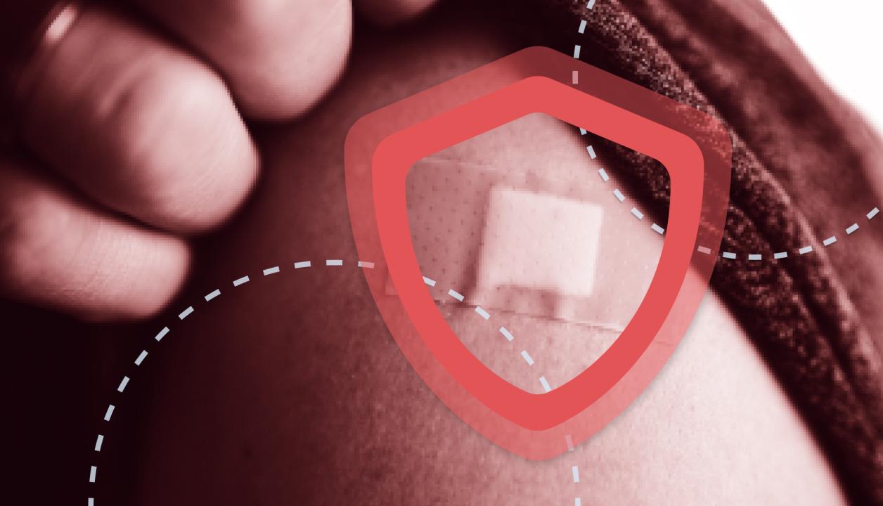 band-aid on a vaccinated shoulder