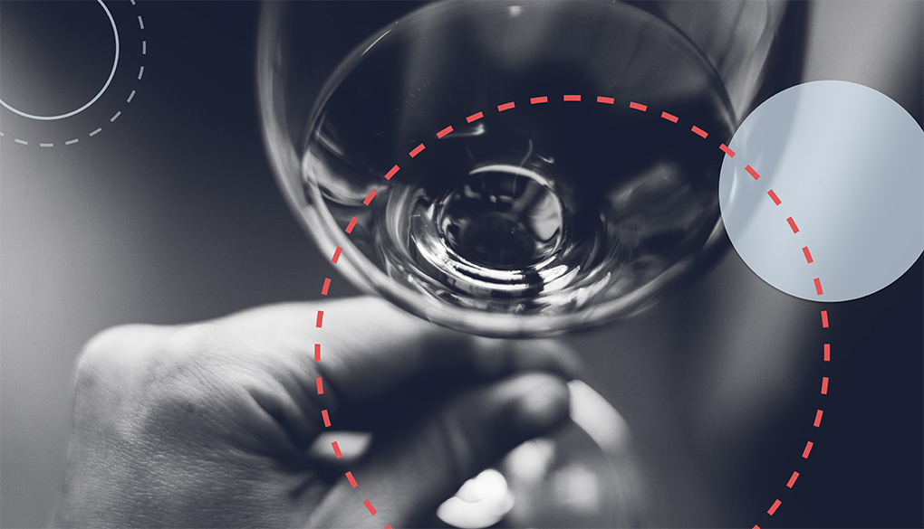 hand holding a wine glass