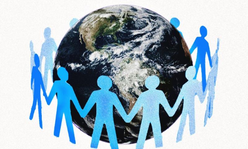 paper cutouts of people around a globe 