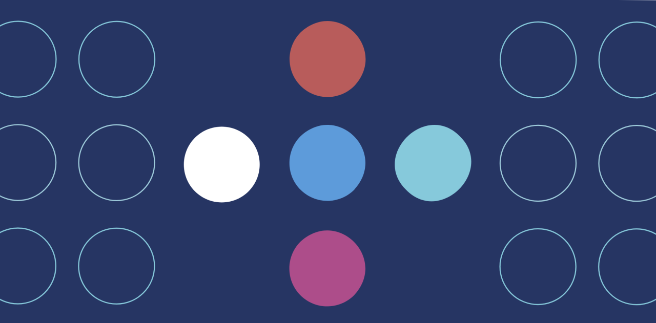 different colored dots on a blue background  