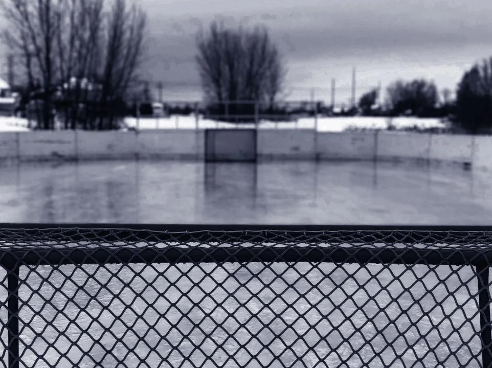 black and white image of a hockey rink 