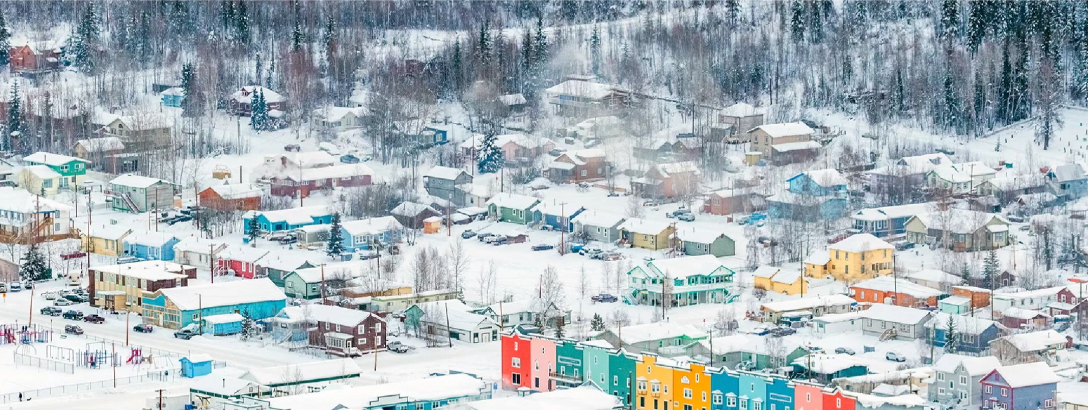colourful houses in snow 