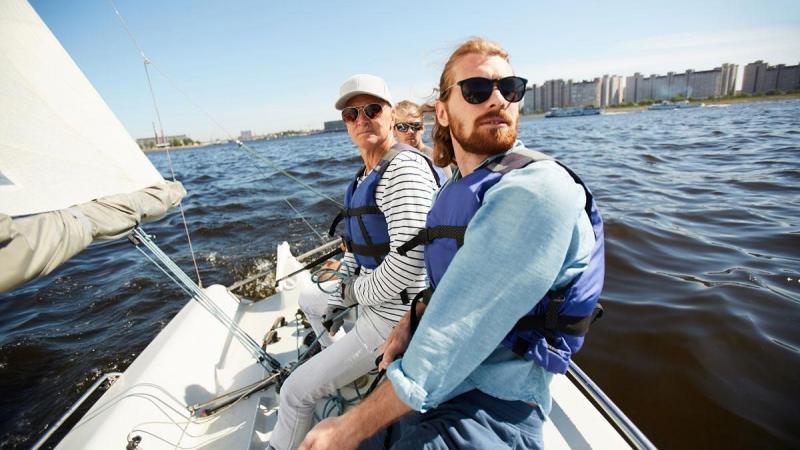 Two men on a sailboat