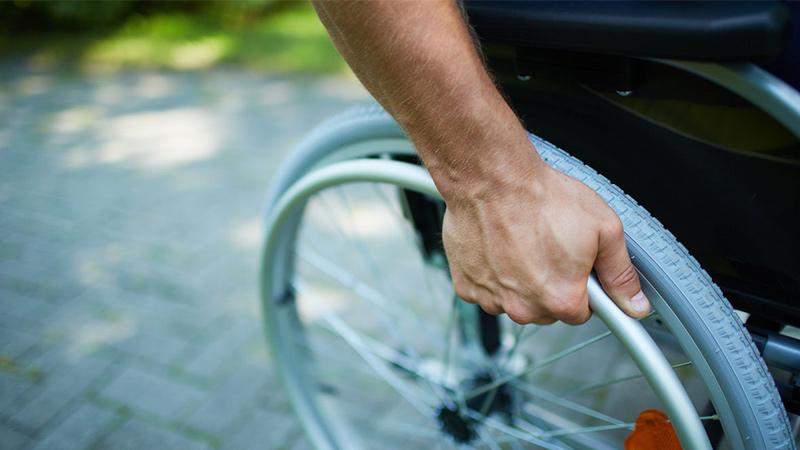 closeup of a man on a wheelchair